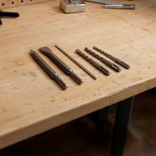 PowerForce 4000 Atomic Martillo percutor SDS ligero. 3J potencia de impacto. Potencia 800W. 3in1. Adaptador brocas convencionales. Incluye brocas y cinceles. Maletín. Cable 3m.