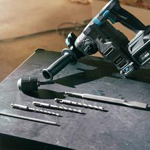 PowerForce 8000 ShockAbsorber Killer SDS-Plus-Bohrhammer mit NEX21-Akku. Brushless-Motor. 3 J Schlagkraft. 3-in-1. Shock Absorber. Einstellbare Geschwindigkeit. Adapter für herkömmliche Bohrer. Inklusive Koffer, Bohrer und Meißel.
