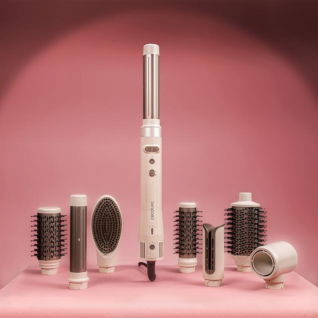 CECOTEC CeramicCare 8in1 AirGlam Gyro Champagne con accesorios sobre fondo rosa