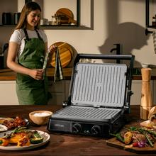 Rock’nGrill 2200 Dual Parrilla eléctrica de 2200 W con control de temperatura en cada plancha de forma independiente, placas reversibles  y apertura de 180º.