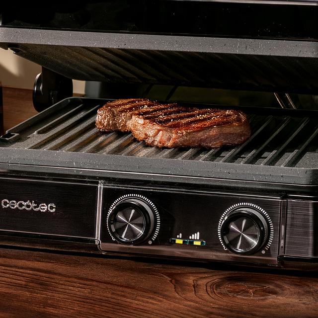 Rock’nGrill 2200 Dual Parrilla eléctrica de 2200 W con control de temperatura en cada plancha de forma independiente, placas reversibles  y apertura de 180º.