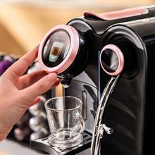Power Caps Spin Cafetera de cápsulas de Nespresso con vaporizador muy compacta.