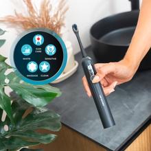 ToothCare UltraSonic PlatiniumSwing Spazzolino sonico con oscillazione, fino a 50.000 giri al minuto, 5 modalità, display, rapporto di pulizia, 8 testine, ricarica wireless e custodia.