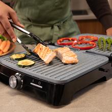 Rock'nGrill 2000 Full Open Parrilla eléctrica con 2000W. Revestimiento de piedra RockStone. Apertura 180º. Bandeja recogegrasas.