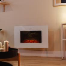 ReadyWarm 3590 Flames Connected White Cheminée électrique décorative de 35” avec une puissance maximale de 2000 W. Deux intensités 1000 W et 2000 W. Contrôle via wifi. Télécommande. Panneau plat en verre trempé. Flamme indépendante et ajustable. Minuterie hebdomadaire. Capteur de porte ouverte.