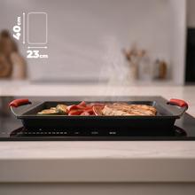 Plancha de asar 40x23cm, Colección Gourmet+Plancha de asar de 40x23cm, apta inducción y todas las cocinas. Construcción de aluminio fundido de 5,5mm con fondo termodifusor encapsulado. Triple capa de revestimiento antiadherente ILAG de la mejor calidad libre de PFOAs.