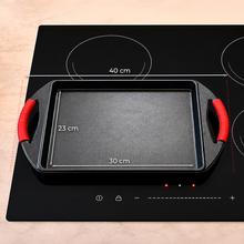 Plancha de asar 40x23cm, Colección Gourmet+Plancha de asar de 40x23cm, apta inducción y todas las cocinas. Construcción de aluminio fundido de 5,5mm con fondo termodifusor encapsulado. Triple capa de revestimiento antiadherente ILAG de la mejor calidad libre de PFOAs.