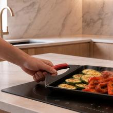 Plancha de asar 40x23cm, Colección Gourmet+Plancha de asar de 40x23cm, apta inducción y todas las cocinas. Construcción de aluminio fundido de 5,5mm con fondo termodifusor encapsulado. Triple capa de revestimiento antiadherente ILAG de la mejor calidad libre de PFOAs.