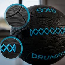 Drumfit WALLPRO-KV 6Kg Wallball: balón de arena y kevlar, resistente a agua y sudor, con agarre mejorado y costuras reforzadas para fuerza y cross training.