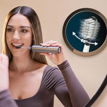ToothCare DeluxeSwing: Cepillo de dientes eléctrico con Oscilación 60º, 3 Modos Personalizados, 3 cabezales, Ligero y compacto