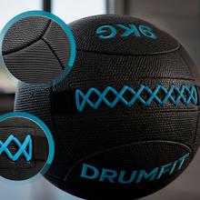 Drumfit WALLPRO-KV 9Kg Wallball: balón de arena y kevlar, resistente al agua y sudor, con agarre y costuras reforzadas para fuerza y cross training.