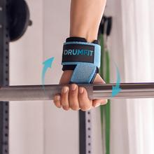Drumfit lifting straps: correas de entrenamiento en algodón reforzado con agarre de silicona y cierre de muñeca ajustable. Ofrecen soporte seguro y cómodo para levantamiento de pesas, remo con barra, dominadas y ejercicios de fuerza intensos.