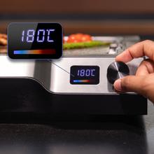 Teppanyaki Steel Plancha eléctrica tipo teppanyaki con placa de acero inoxidable desmontable, temperatura regulable de 100 a 250 °C y accesorios incluidos.