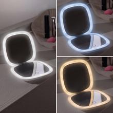 Mini Espelho FaceCare. Espelho de maquiagem dupla face com aumento de 10x e um espelho com aumento de 1x, ambos com iluminação LED. Possui sensor de toque, brilho ajustável e três temperaturas de luz (fria, quente e natural). Alimentado por uma bateria recarregável de 600 mAh e carregamento USB-C.