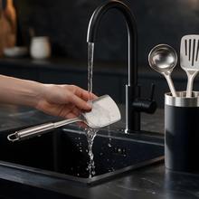 Set di 4 utensili da cucina in acciaio inox Autore