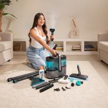 Conga Carpet&Spot Clean 15000 Steam Elite. Limpiatapicerías 3 en 1 con función vapor que pulveriza, aspira y limpia en una pasada. Incorpora motor de 600 W, caldera de 1200 W y vapor a ≥60 ºC para una limpieza más profunda. Cuenta con succión de hasta 12 kPa, depósitos de 1600 ml (agua limpia) y 1500 ml (agua sucia). Incluye 16 accesorios para tapicerías, manchas y limpieza con vapor en múltiples superficies.