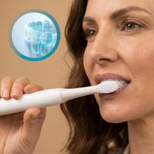 Escova de dentes elétrica sônica recarregável ToothCare Sonic White com 3 modos de escovação, temporizador de 2 minutos e alertas de quadrante a cada 30 segundos. Inclui 2 cabeças de escova e indicador LED.