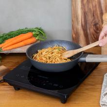 Full Crystal Onyx Heat Plaque à induction numérique avec verre de sécurité et contrôle tactile. Couleur noire.