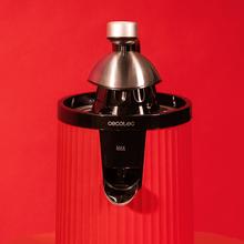 Presse-agrumes électrique rétro Xqueeze RetroJuice 600 rouge pour oranges et agrumes, puissance 600 W, filtre en acier inoxydable, cône en plastique, levier d'extraction de la pulpe et système anti-goutte.