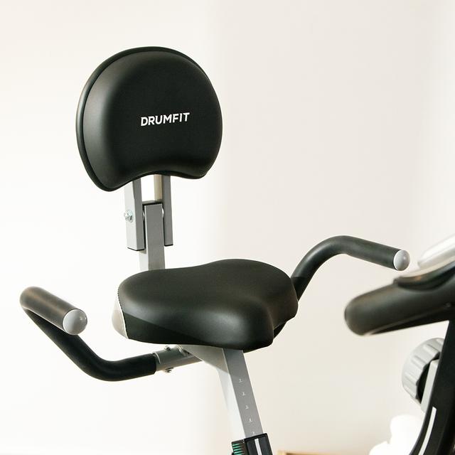 DrumFit X-Bike Neo Ultra Bicicleta estática plegable con respaldo. Pantalla LCD. Resistencia magnética variable. Sillín confort con respaldo y agarres laterales. Soporte para tablet y ruedas de transporte.