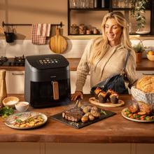 Cecofry&Grill Smokin' 8500 Friteuse à air avec double résistance et fumoir pour un grillage parfait de la viande, capacité de 8,5 litres et puissance de 2200 W pour des plats sains.
