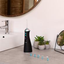 ToothCare 1100 Jet Clean Liberty Irrigador bucal portátil, para limpiar, sanear y cuidar en profundidad todo tipo de encías con sus seis posiciones de uso y 8 boquillas.