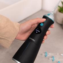 ToothCare 1100 Jet Clean Liberty Irrigador bucal portátil, para limpiar, sanear y cuidar en profundidad todo tipo de encías con sus seis posiciones de uso y 8 boquillas.
