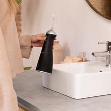 ToothCare 1100 Jet Clean Liberty Irrigador bucal portátil, para limpiar, sanear y cuidar en profundidad todo tipo de encías con sus seis posiciones de uso y 8 boquillas.