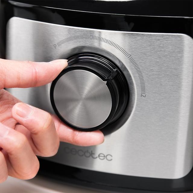 Robot culinaire Comino 1000 Spatula, 1000 W, 2 vitesses, fonction pulse, bol de 2 L. 3 disques de découpe : lame à hacher, lame à pétrir, disque à jus et disque à crémer. Corps en plastique et acier inoxydable.