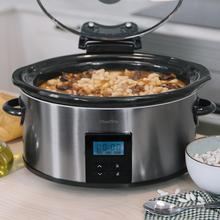 Chupchup Matic Spatula Olla de cocción lenta digital ovalada con 240 W. Pantalla LCD. 5,5 litros de capacidad. Dos niveles de potencia + función mantener caliente. Tapa de cristal. Cubeta cerámica y extraíble.