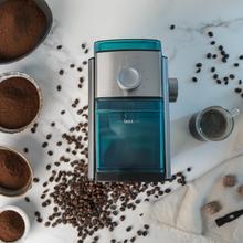 SteelMill 2000 Adjust max Moulin à café électrique et en acier inoxydable avec 150 W de puissance, 17 niveaux de mouture et capacité pour remplir 12 tasses de café.