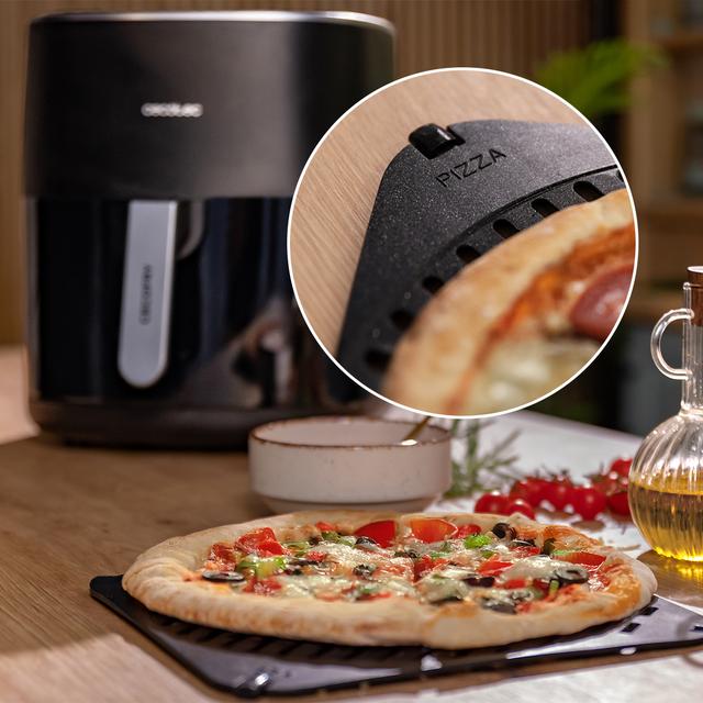 Cecofry&Grill 6500 Friteuse à air avec double élément chauffant pour un brunissement parfait et une saveur grillée sur les viandes, capacité de 6,5 litres et puissance de 2200 W pour des plats sains.
