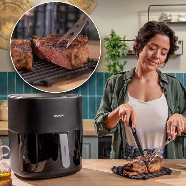 Cecofry&Grill 6500 Friteuse à air avec double élément chauffant pour un brunissement parfait et une saveur grillée sur les viandes, capacité de 6,5 litres et puissance de 2200 W pour des plats sains.